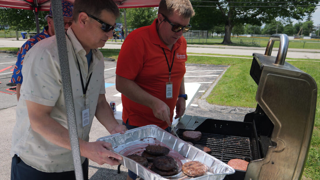 Jamie and Mike grilling at the Adult Day BBQ Easterseals NH