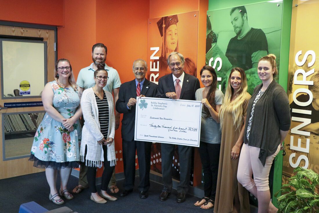 In Photo: Bobby Stephen (center left) and Easterseals President & CEO Larry Gammon (center right) are joined by Easterseals NH Youth Transitional Services staff to accept a check for $31,514 that will benefit Easterseals clients.