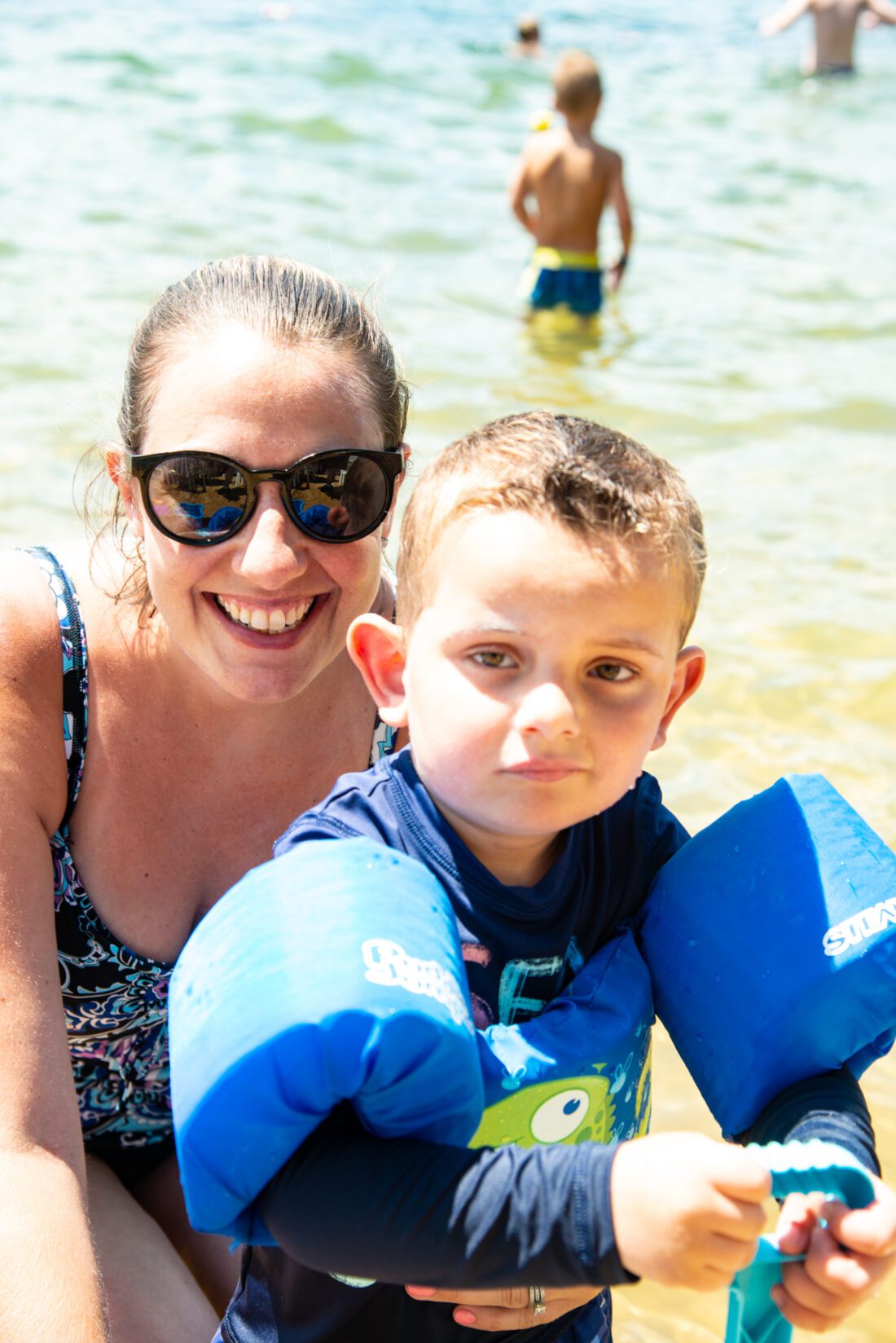 IN PHOTO: Easterseals NH Child Rep Dominic DiFranco and his mom Nicole enjoy some fun in the water during the 19th Annual HK Powersports Land & Lake Poker Run for Easterseals NH.