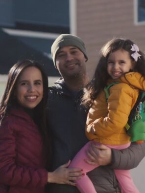 veteran with his wife and daughter