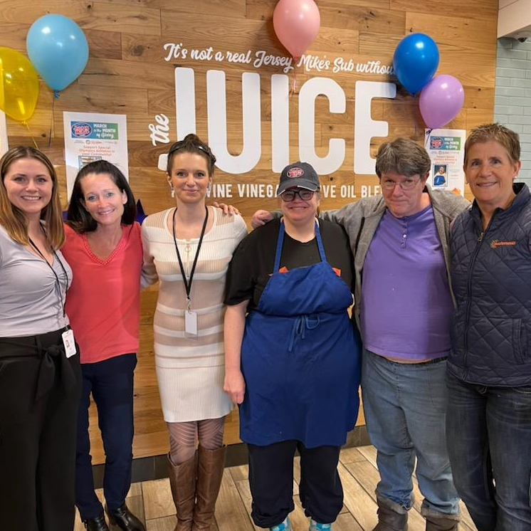 Group photo of Easterseals NH client and staff taken at Jersey Mikes