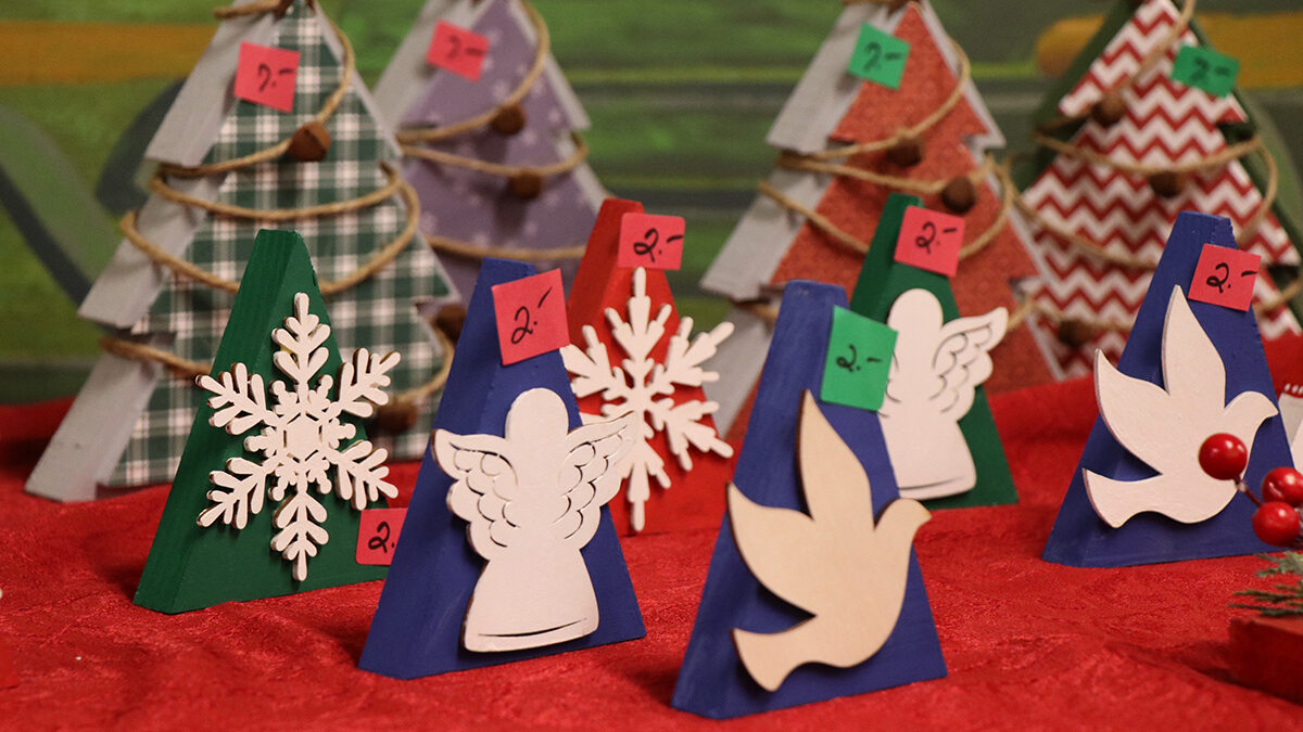 Ornaments on a table at a holiday craft fair.