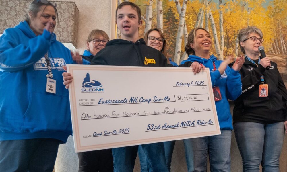 Lucas, a 2024 camper, helped present the check at the conclusion of the event.