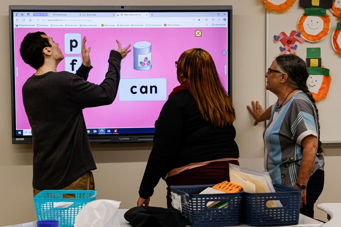 Student and teachers inside Gammon Academy at Zachary Roads new classroom.