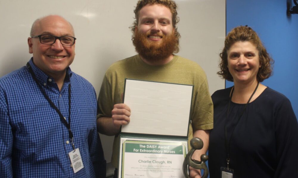 Pictured (l. to r.): Easterseals NH Senior VP of Residential & Educational Services John Soucy, Gammon Academy Residential Registered Nurse and DAISY Award® Winner Charlie Clough, and Residential & Educational Services VP of Clinical Services Dolores Donovan.
