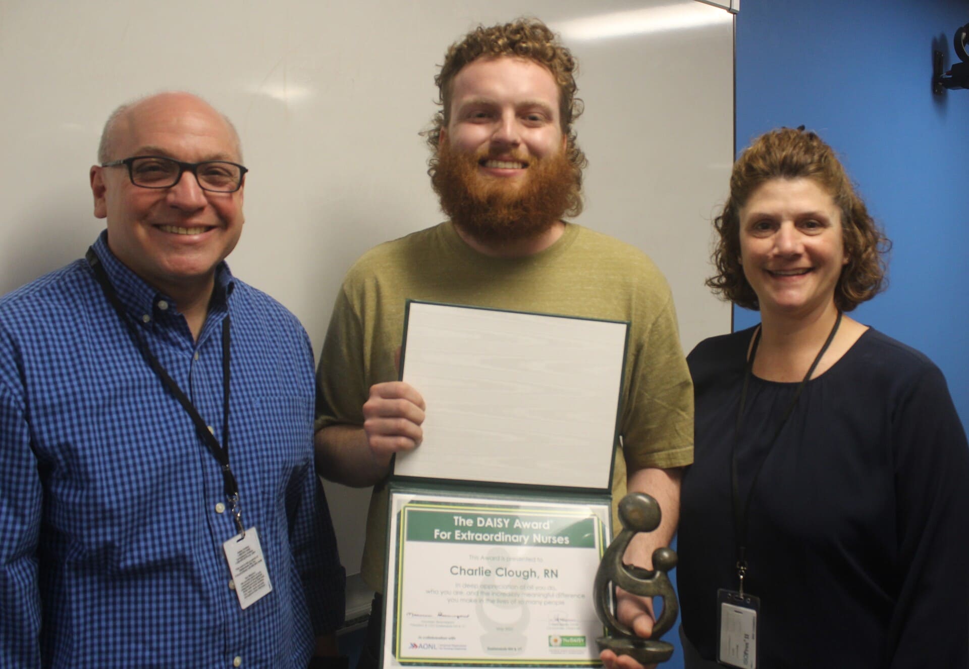Pictured (l. to r.): Easterseals NH Senior VP of Residential & Educational Services John Soucy, Gammon Academy Residential Registered Nurse and DAISY Award® Winner Charlie Clough, and Residential & Educational Services VP of Clinical Services Dolores Donovan.