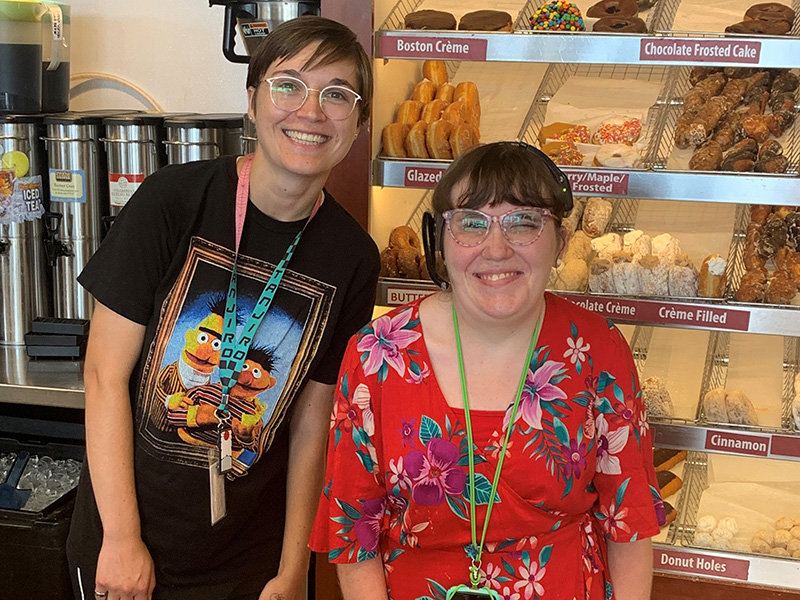 Easterseals NH client and staff member working at Dunkin Donuts.