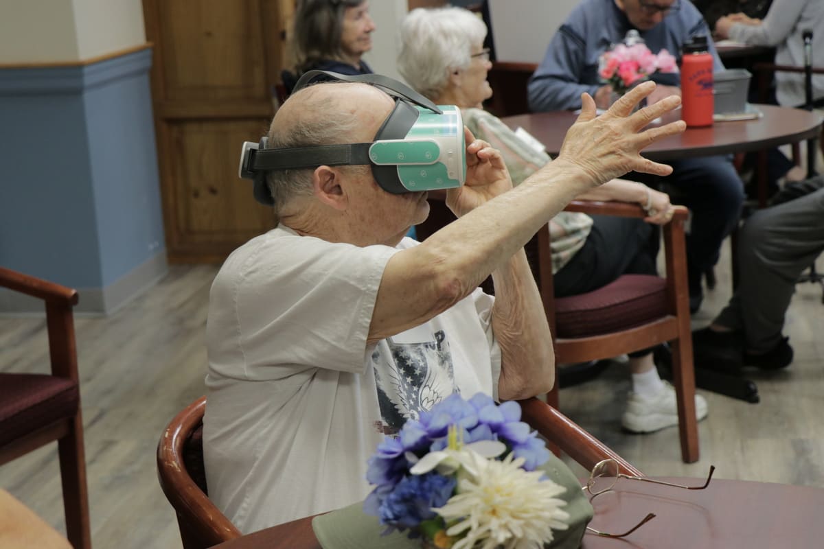 Easterseals NH Adult Day Manchester clients using VR headsets