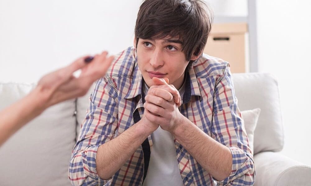 teen boy at psychologist