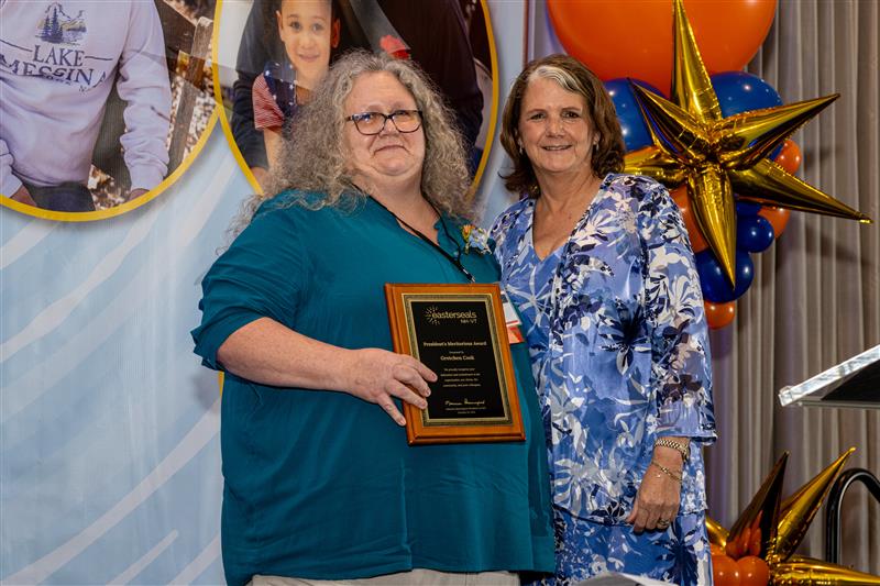 Gretchen Cook (left), Director of Residential & Educational Services and Operations at Easterseals NH’s Gammon Academy in Lancaster, received the President’s Meritorious Award at the agency’s Annual Celebration breakfast.
