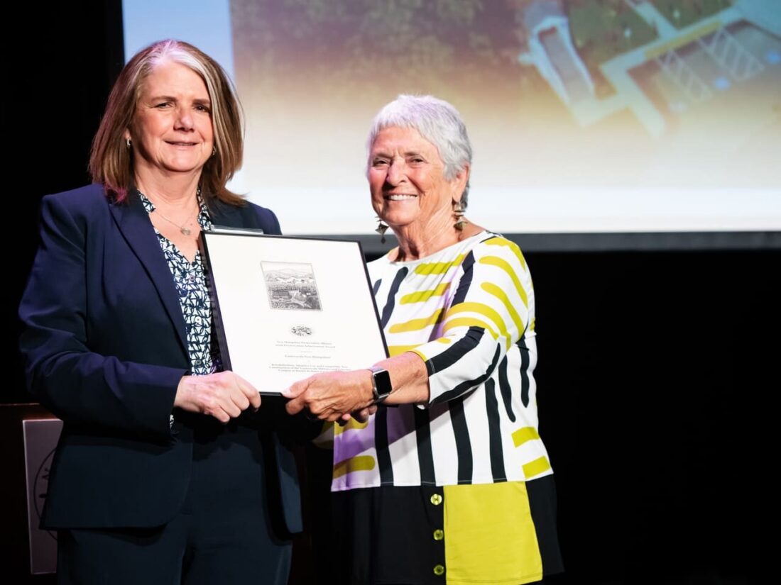 Easterseals NH Wins Preservation Achievement Award - Maureen Beauregard, President & CEO of Easterseals NH & VT, joined Alice DeSouza, former Chair of the New Hampshire Preservation Alliance Board of Directors, on stage at the Concord City Auditorium, in accepting a 2026 Preservation Achievement Award by the NH Preservation Alliance for the rehabilitation and adaptive reuse of the historic Daniel Webster Farm in Franklin.