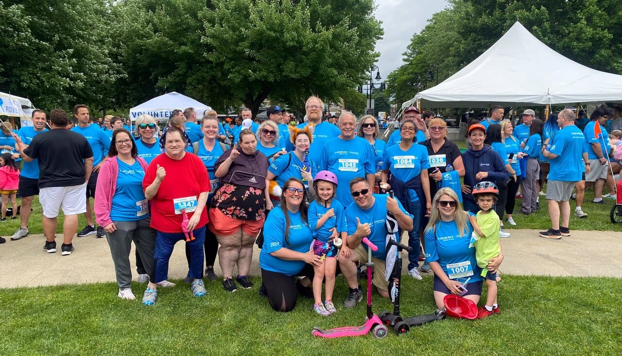 Pictured, from a previous year's Eversource 5K, are the Adult Services Avengers, made up of consumers and staff from across Easterseals NH’s Community-Based Services programs.