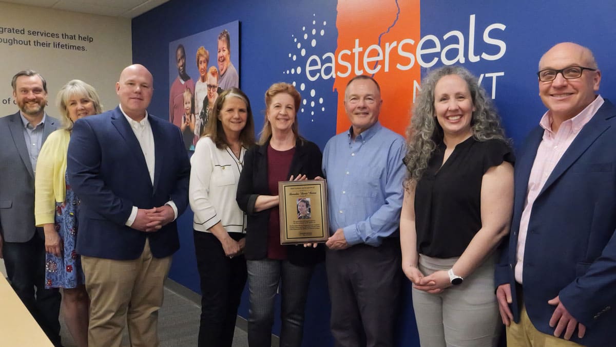 Pictured (L to R) are: Chris Wellington, Sr. Vice President, Housing & Property Development; Kathy Flynn, Vice President, Donor Relations; Bryan Bouchard, Board Chair; Maureen Beauregard, President & CEO; Tamme and Tom Dustin, co-trustees of the Bernadine Herron Estate; Pamela Hawkes, Chief Development Officer; and John Soucy, Sr. Vice President, Residential & Educational Services.
